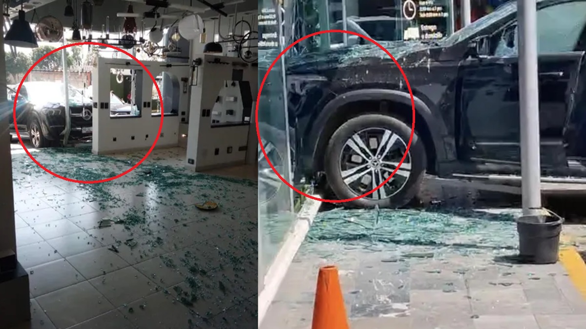 ¡Aparatoso accidente! Camioneta de lujo termina dentro de negocio en Puebla