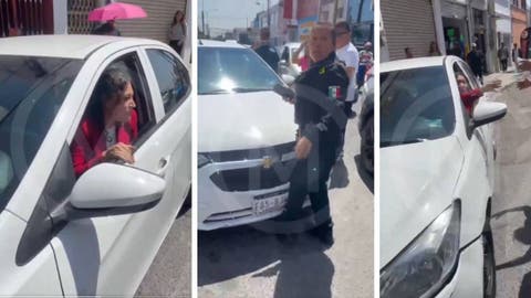 Escándalo en Puebla: Mujer furiosa ataca a agente de tránsito y roba su radio tras ser multada