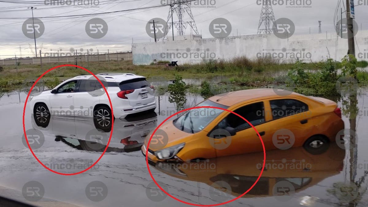 Periférico bajo el agua: vehículos quedan varados por inundación en zona de Ocotlán