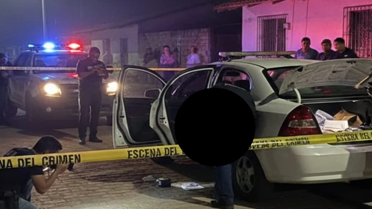 Hallan el cuerpo de un joven frente a la casa de sus padres en Puebla