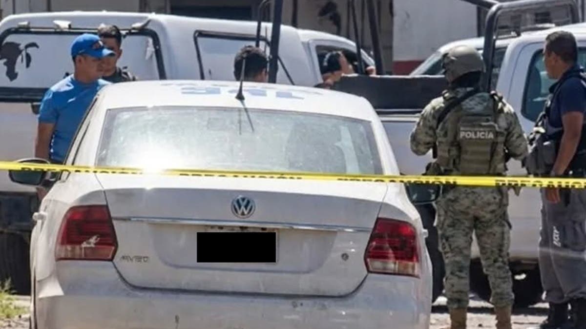 Hallan cuerpo dentro de una maleta en taxi robado