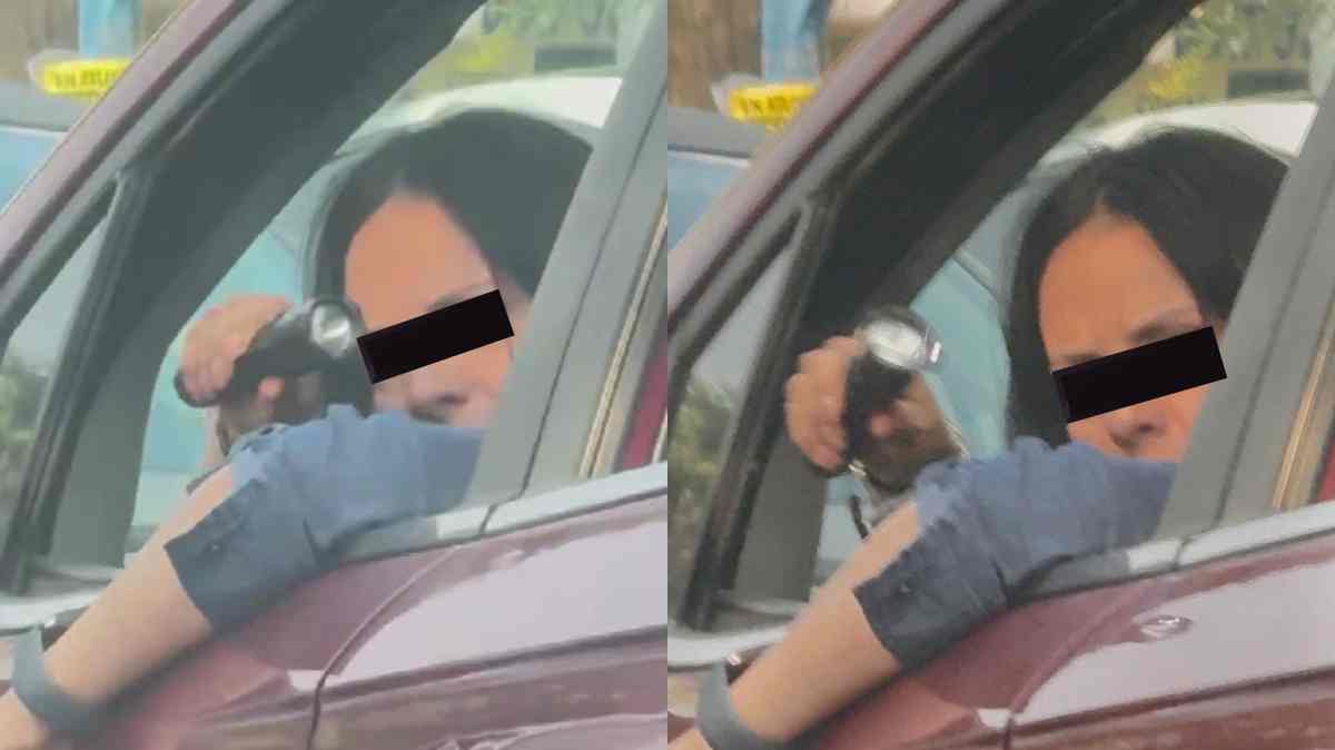 Captan a conductora sacando un táser por la ventana durante altercado vial en Puebla; usuarios la vinculan con La Salle
