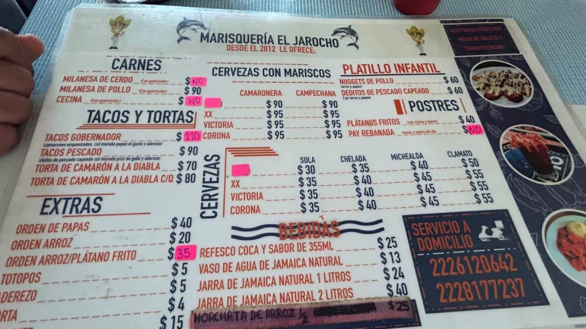 Cliente denuncia presuntos precios distintos al pagar en marisquería de Cholula; también señala presencia de moscas